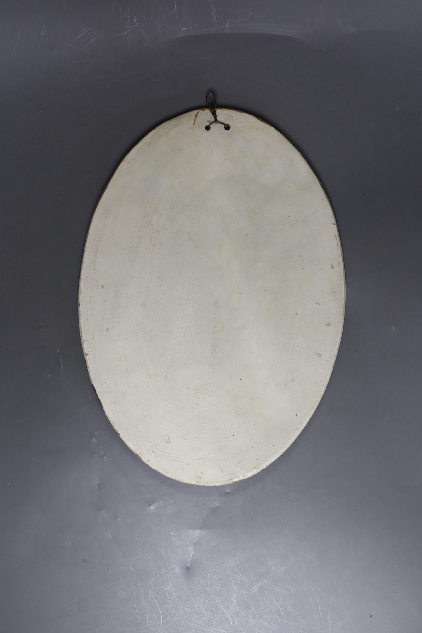 A late 18th century creamware Autumn oval plaque, 32.5cm long